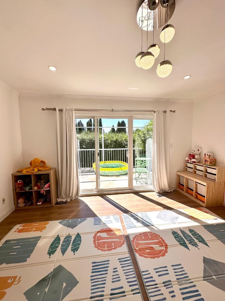 Sunlit playroom at Mini Step, opening onto the patio